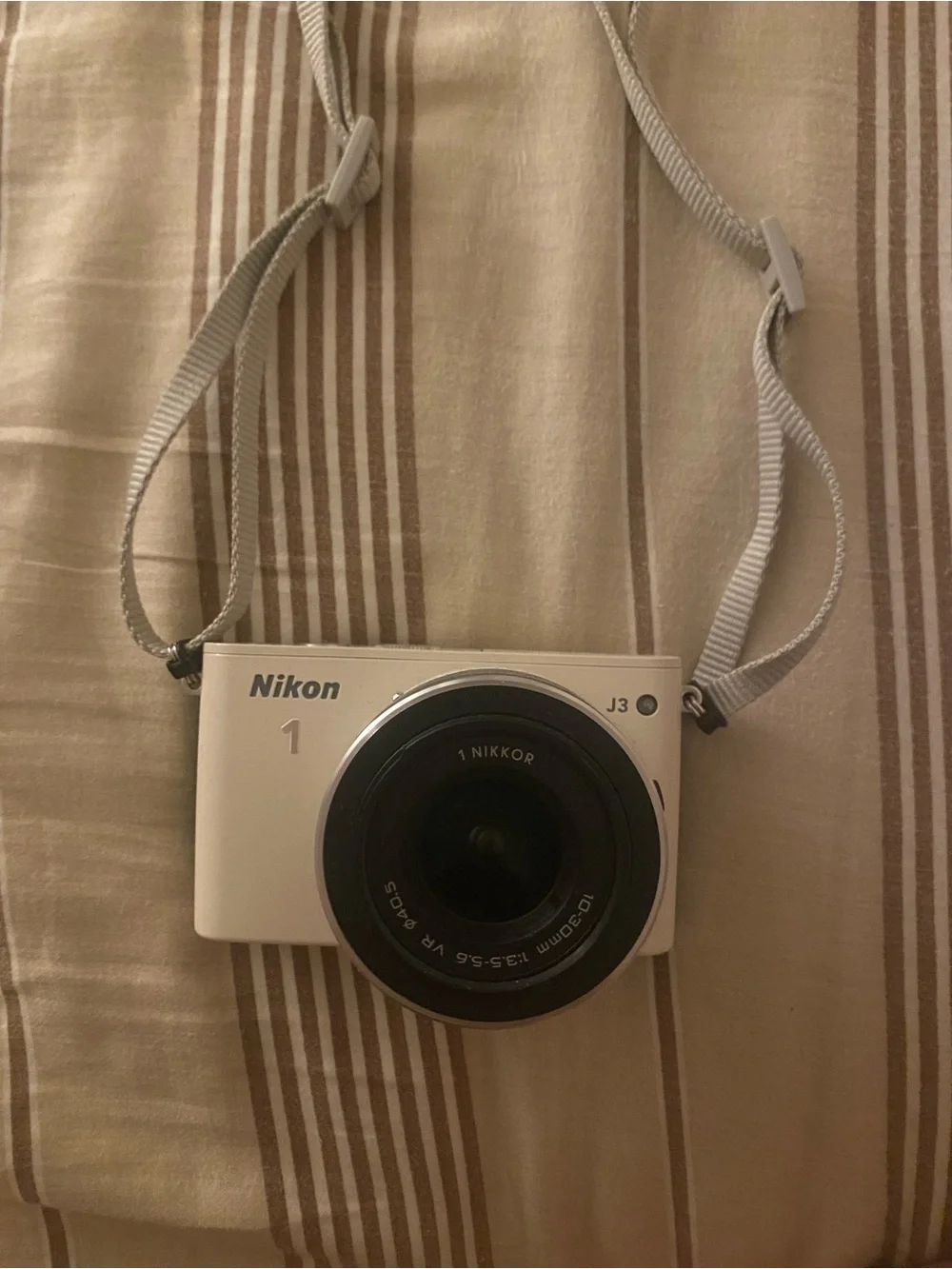 Nikon J3 Compact Mirrorless Camera in White with 10-30mm Lens